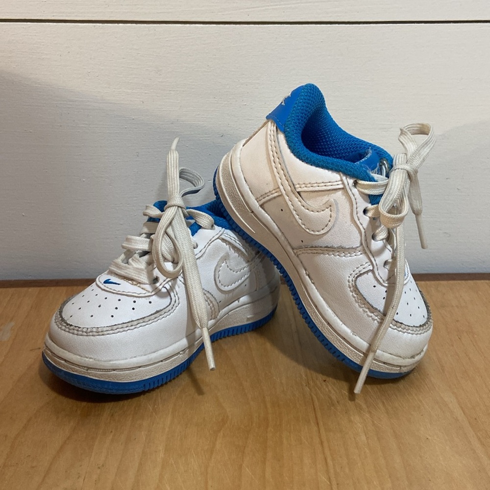 Nike shoes, toddler size 4c. White and blue lace up. Normal wear, good condition